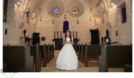 Girl in white dress in a church.