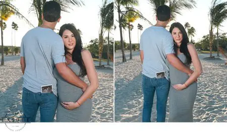 Pregnant couple on beach with ultrasound picture.
