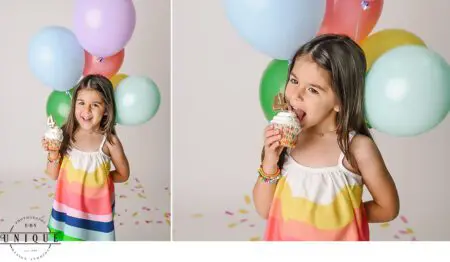 Girl eating cupcake with balloons