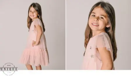 Young girl in a pink tulle dress.