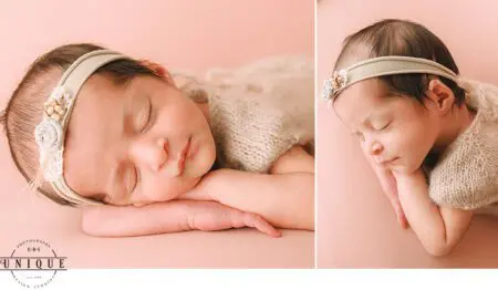 Sleeping newborn baby girl with headband.