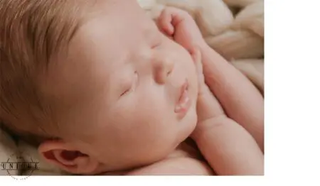 Close-up of a sleeping newborn baby.