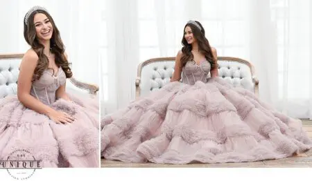 Smiling woman in pink gown and tiara.