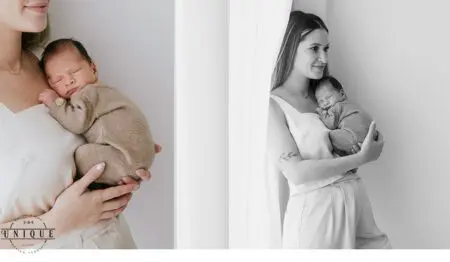 Mother cradling a sleeping newborn baby.