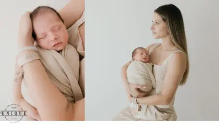 Mother holding newborn baby wrapped in blanket.