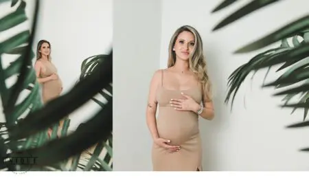 Pregnant woman in a beige dress.