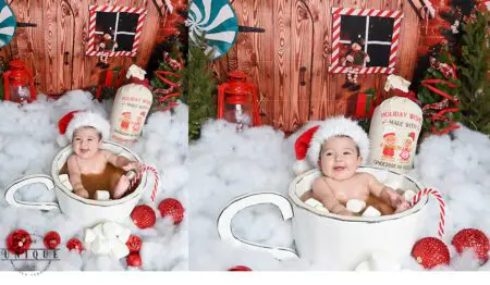 Baby in a giant mug with marshmallows.