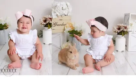 Baby girl in white dress with bunny.