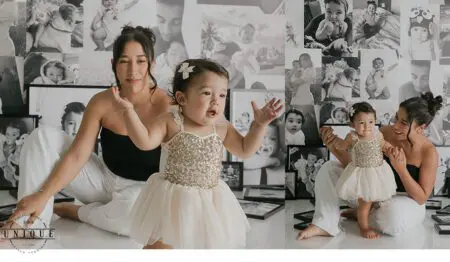 Woman and toddler girl with black and white photos.