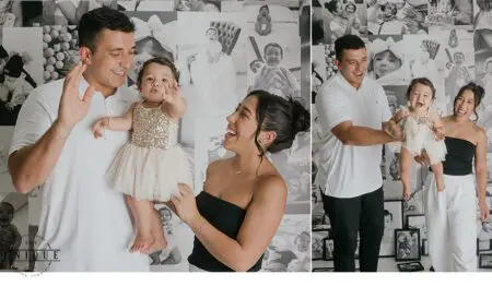 Family portrait with baby girl in a dress.